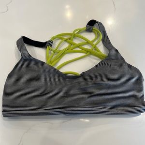 Free to be bra. Black and grey stripes with lime green straps